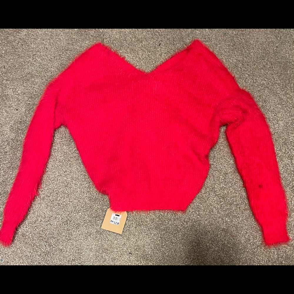 Tomato red fuzzy sweater! Twist knot in back!
